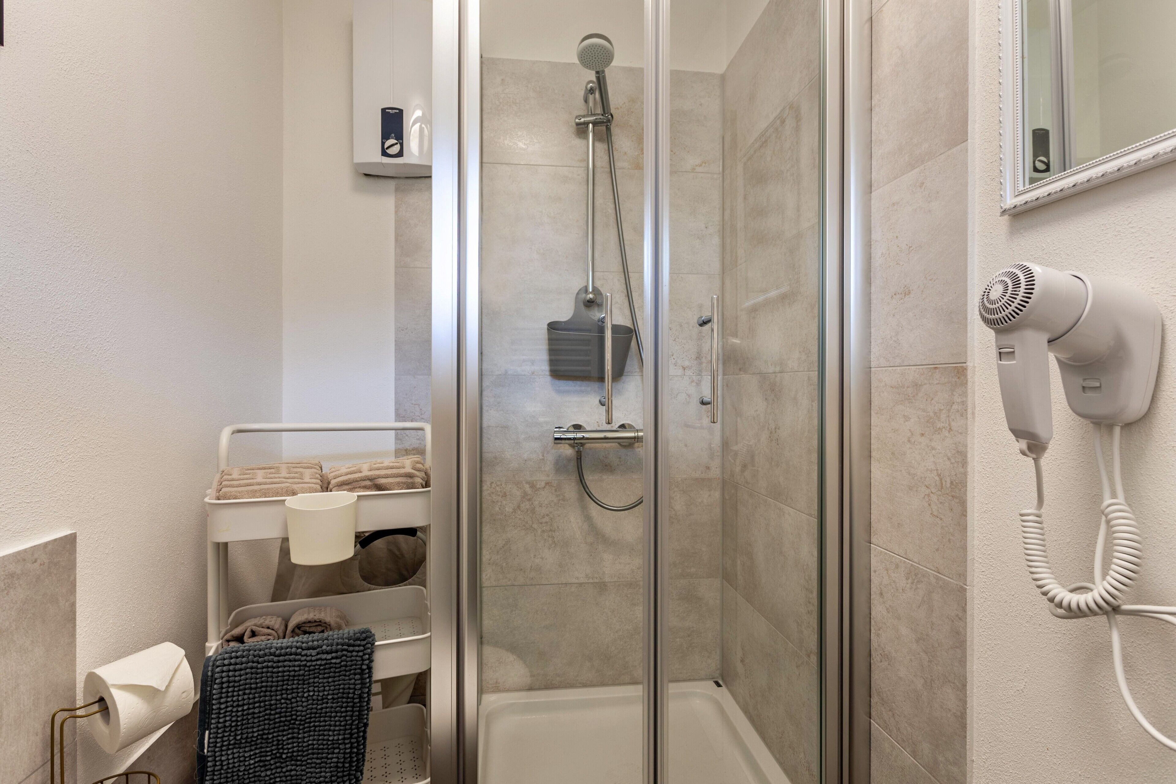 Shower, free toiletries, hair dryer, towels