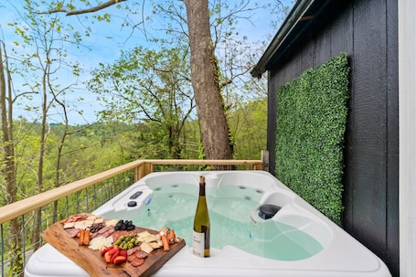 Outdoor spa tub. New Tiny Home W/Mountain Views