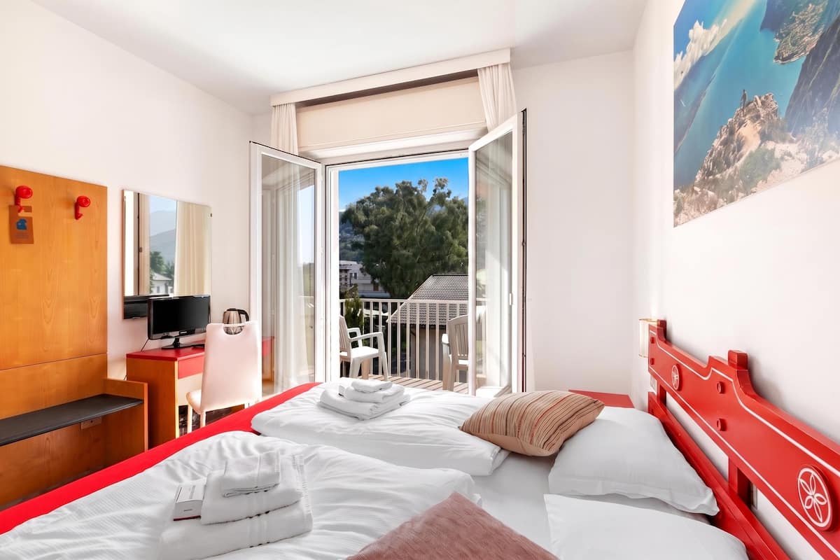 Family Room, 1 Bedroom, Balcony (Bike & Wind Hotel Villa Maria 13) | 1 bedroom, in-room safe, desk