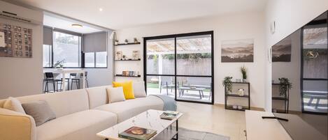 Villa, 5 Bedrooms, Patio, Garden View | Living area | 65-inch Smart TV with digital channels