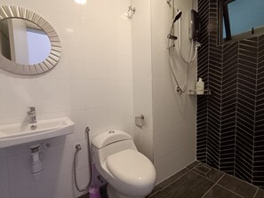 Shower, bidet, towels, soap