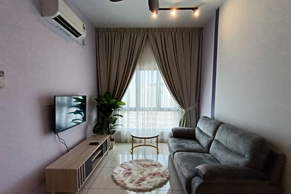 Executive Apartment | Living area | 800-cm Smart TV with digital channels