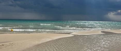 Beach nearby, sun loungers