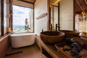 Combined shower/tub, hair dryer, towels, soap