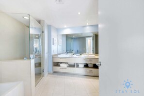 Shower, hair dryer, towels