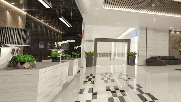 A modern lobby with a checkered floor, potted plants, a reception desk, and a seating area. - 1 BR Fully Furnished Condo in Makati with Pool and Parking - Red Res. Unit 1133 (Makati)