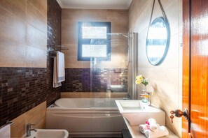 Hair dryer, bidet, towels, soap