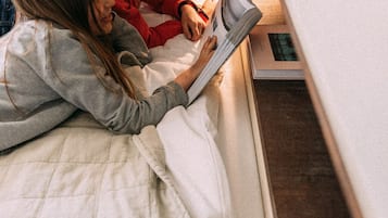 Familien-Suite | 1 Schlafzimmer, Verdunkelungsvorhänge, kostenloses WLAN, Bettwäsche
