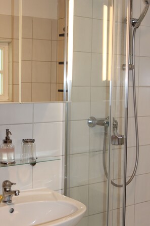 Shower, free toiletries, hair dryer, towels