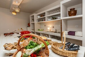 Apartment (A1) | Private kitchen | Fridge, microwave, stovetop, dishwasher - Apartments Sonata (Omis)