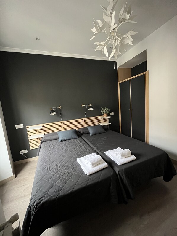 Desk, free WiFi, bed sheets