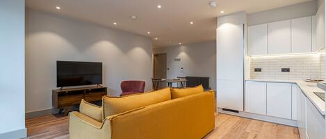 Apartment (1 Bedroom) | Living area | 32-inch TV with digital channels