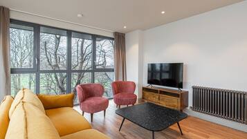 Apartment (3 Bedrooms) | Living area | 32-inch TV with digital channels