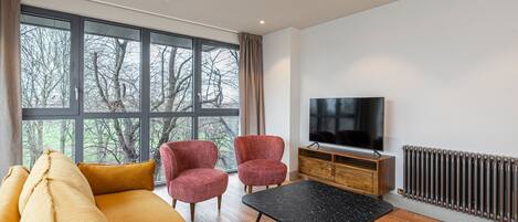 Apartment (3 Bedrooms) | Living area | 32-inch TV with digital channels