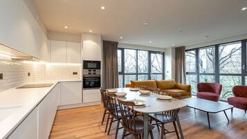 Apartment (3 Bedrooms) | Living area | 32-inch TV with digital channels