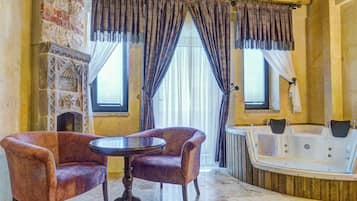 Deluxe Suite | Egyptian cotton sheets, premium bedding, Select Comfort beds, minibar