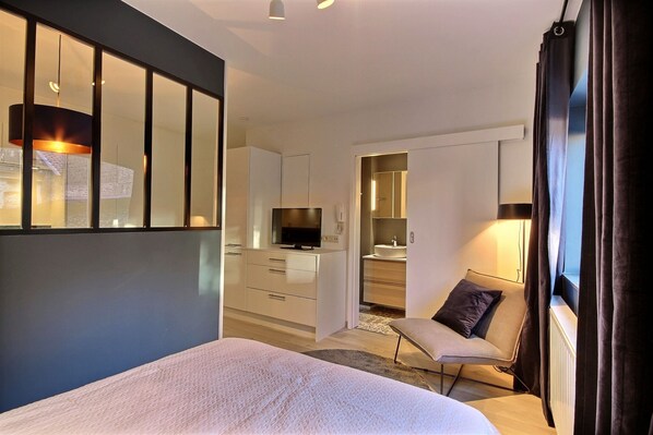 1 dormitorio, tabla de planchar con plancha, wifi