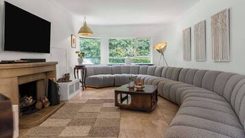 Smart TV, fireplace, books