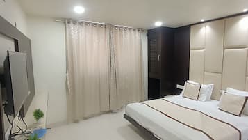 Deluxe A/C Room | 1 quarto, quartos à prova de som, Wi-Fi de cortesia