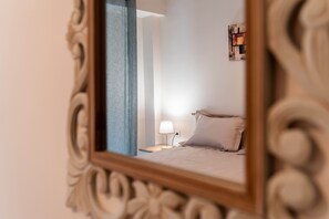 Apartament | Llençols de cotó egipci, roba de llit d'alta qualitat i cobrellits