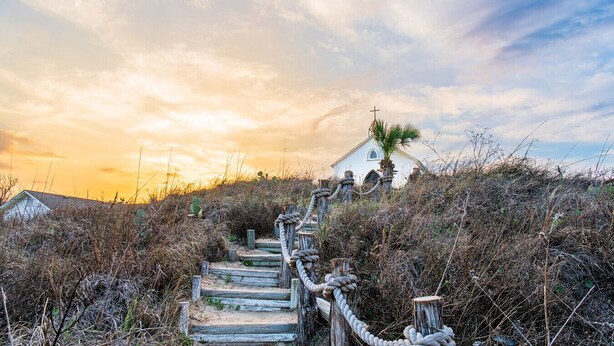 Unclassified image, 1 of 63, button - "Escape to Palm SunDaze, where the soothing ocean breeze melts your cares away, embracing you in the tranquility of coastal living. (Port Aransas)