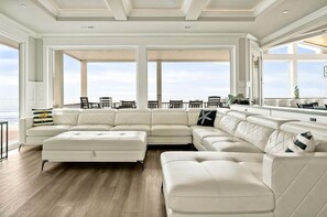 Smart TV, books - Experience luxury at Suite Caroline, an oceanfront haven in Oak Island, NC! (Oak Island)