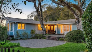 A two-story house with a front porch, a stone pathway, and a well-maintained lawn. - Wine Country Retreat w/ Pool, 10 Mi to Dtwn Sonoma (Glen Ellen)