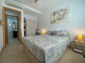 1 bedroom, desk, iron/ironing board, travel cot