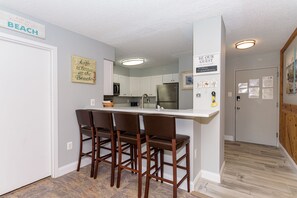 Fridge, microwave, toaster, cookware/dishes/utensils - Oceanfront Building With Great Ocean and Bay Views (Ocean City)