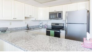 Coffee/tea maker, fridge, microwave, dishwasher - 2 Bedroom Oceanfront with a Pool (Ocean City)