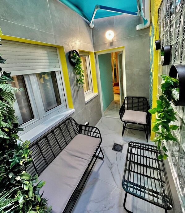 Appartement Luxe, plusieurs lits, patio | Terrasse/Patio