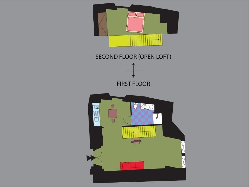 A hotel layout with a second floor open loft and a first floor with a kitchen, dining area, and a red sofa.