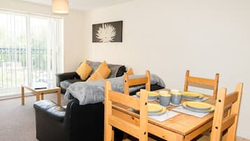 Comfort Apartment | Living area | 32-inch LED TV with digital channels