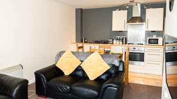 Comfort Apartment | Living area | 32-inch LED TV with digital channels