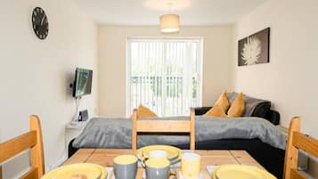 Apartamento conforto | Área de estar | TV LED 32 polegadas com canais digitais