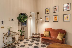 Deluxe Apartment, 2 Bedrooms | Living area | 50-inch Smart TV with digital channels - BRAMA by HiSuiteRome (Rome)