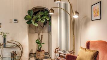 Deluxe Apartment, 2 Bedrooms | Living area | 50-inch Smart TV with digital channels