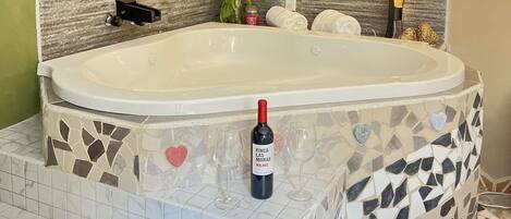 Regadera y tina de hidromasaje