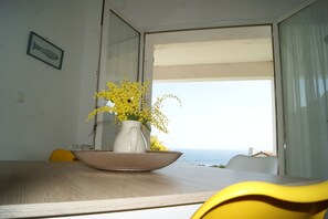 Dining - Les Citronniers - View on the sea and the little harbor of Santa Severa (Luri)