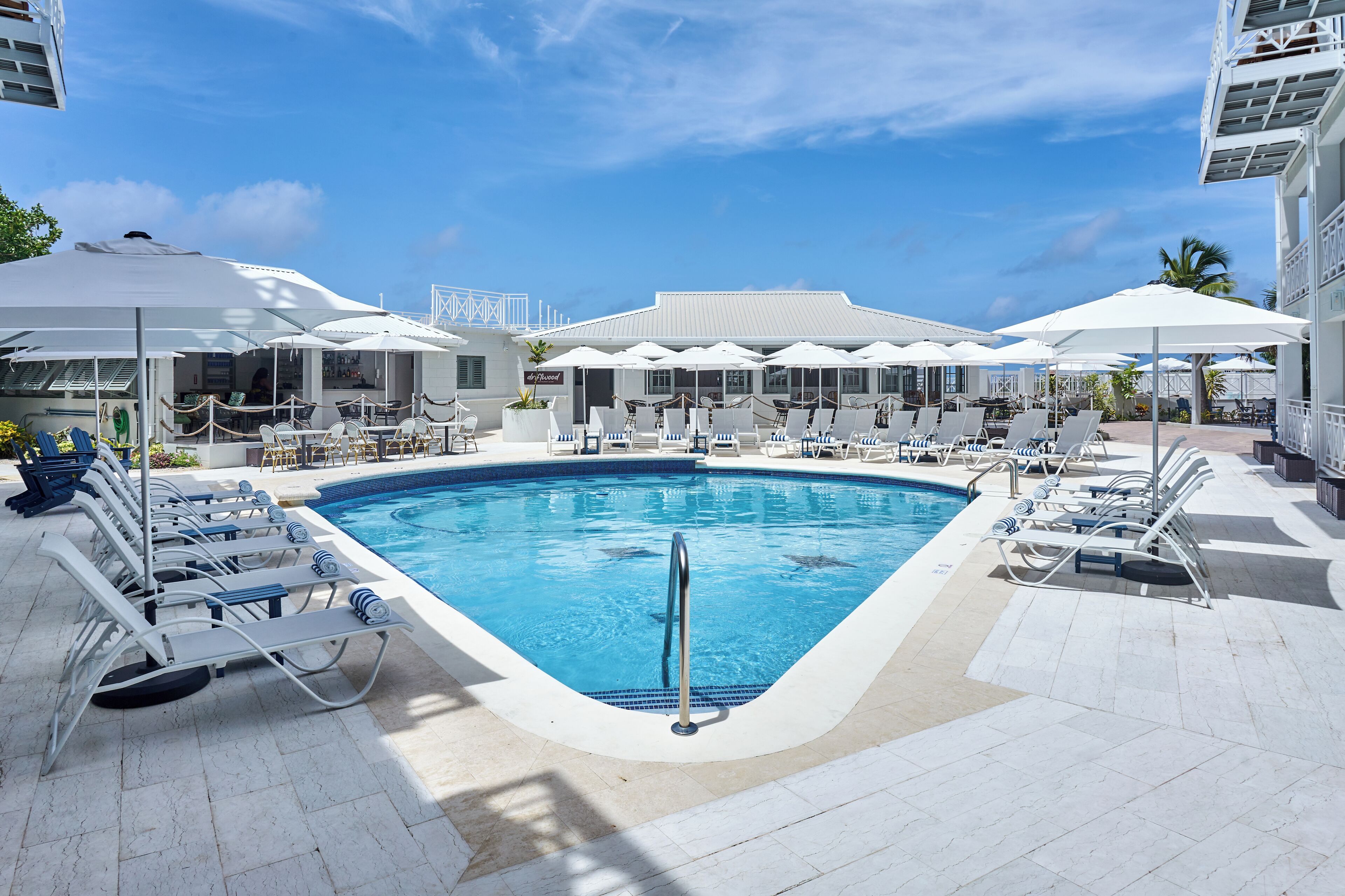 Outdoor pool, pool umbrellas, sun loungers