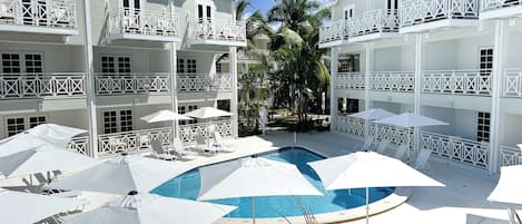 Outdoor pool, pool umbrellas, pool loungers