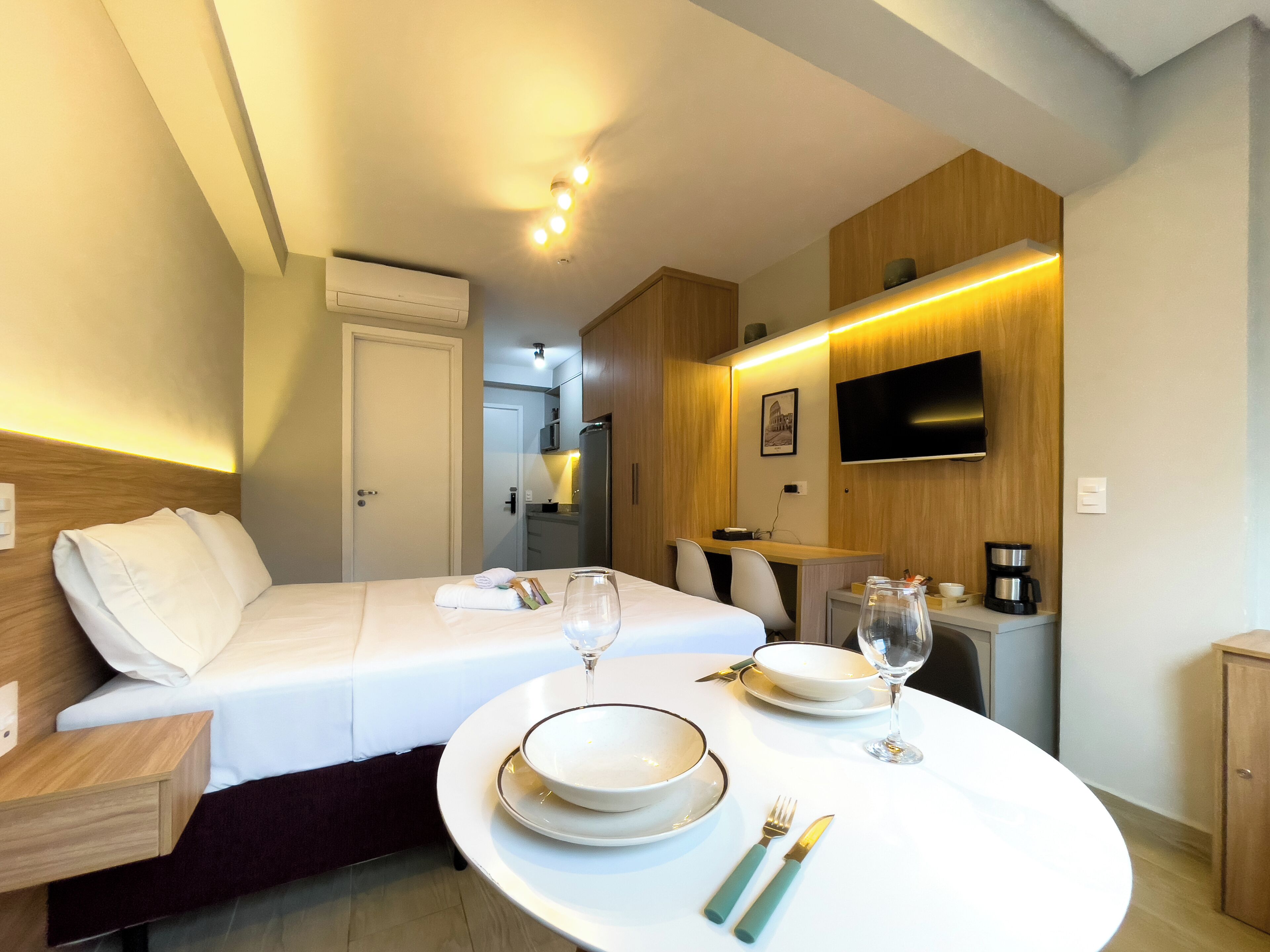 Studio | Premium bedding, desk, laptop workspace, blackout curtains