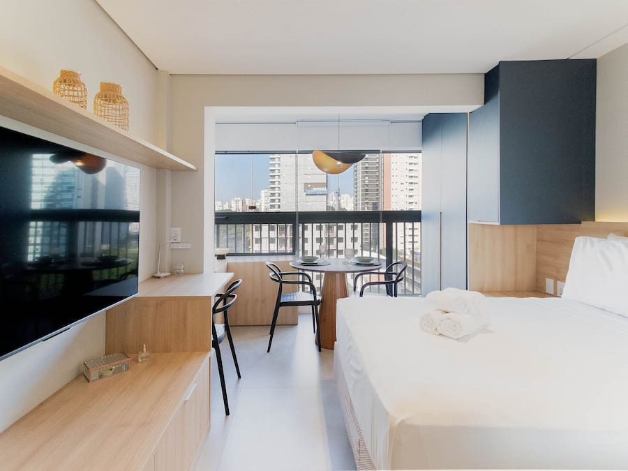 Studio 1015 NIK | Premium bedding, desk, laptop workspace, blackout drapes