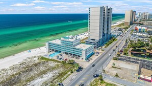 A coastal hotel with a pool, adjacent to a beach and ocean. - Beachfront Studio, Sleeps 3, Pool (Panama City Beach)