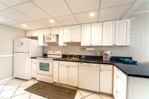 Private kitchen - Radiant Sands: Lux 1-bedroom condo with WiFi, AC in Charming Ocean City (Ocean City)
