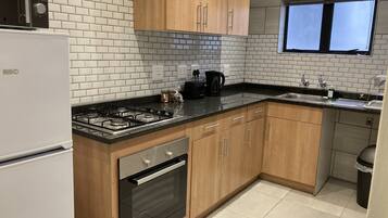 Cottage Superior | Dapur pribadi | Lemari es, microwave, kompor, dan mesin espresso