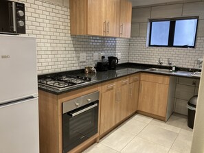 Superior Cottage | Private kitchen | Fridge, microwave, stovetop, espresso maker