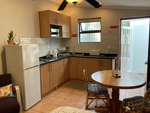 Standard Cottage | Private kitchen | Fridge, microwave, stovetop, espresso maker