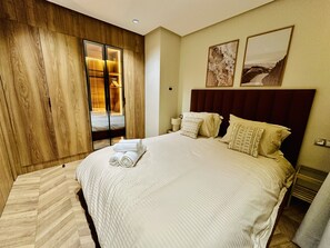 Apartament exclusiu | 1 dormitori, planxa i posts de planxar, wifi gratuïta i roba de llit