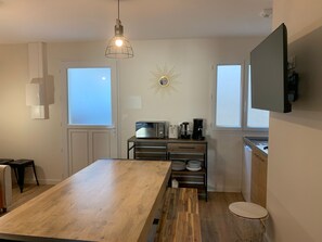 Apartment | Living area | 32-inch flat-screen TV with digital channels